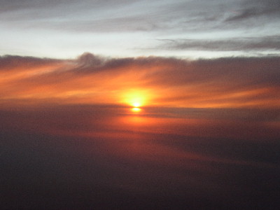 Sonnenuntergang hinter Wolkenschleiern