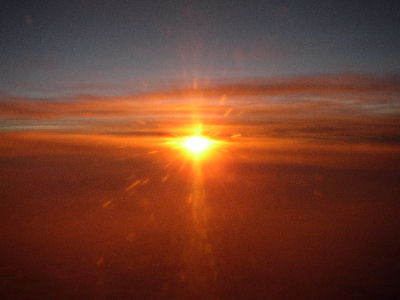 Bei Sonnenuntergang im Flug