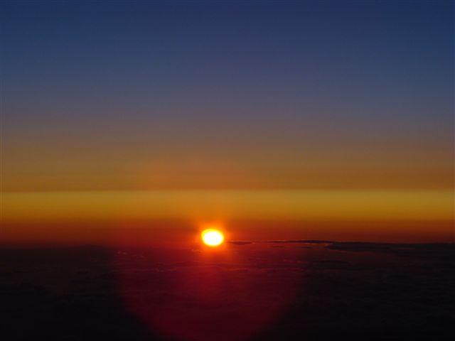 Bei Sonnenaufgang im Flug